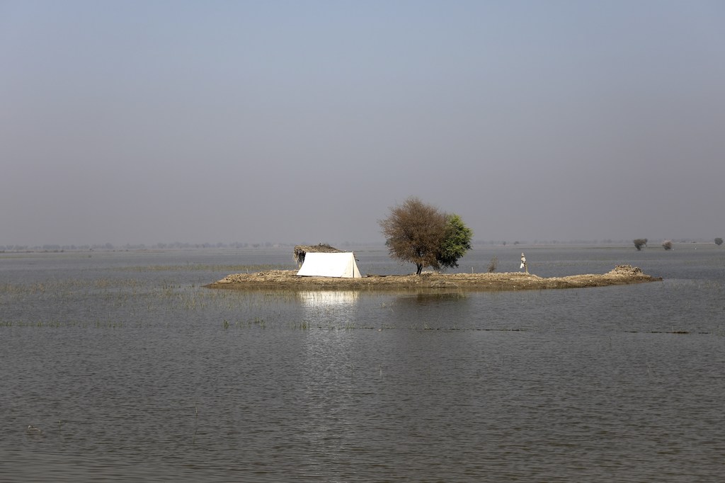 In October 2022, a tent surrounded by flood water in Pakistan's Sindh province. More than 30 million people across the country were affected by the unprecedented floods triggered by intense monsoon rains.